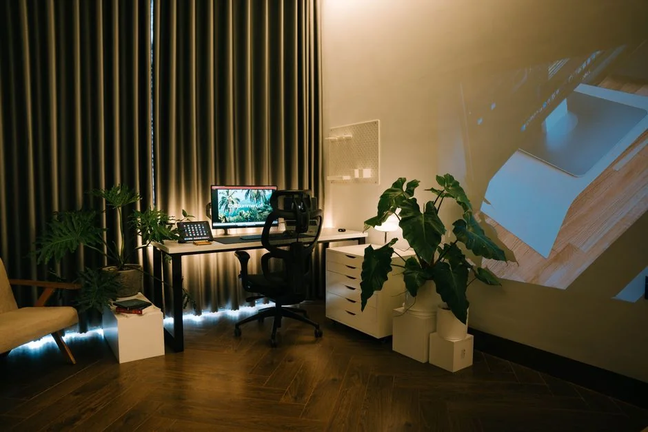 A modern computer screen displaying web design work, showcasing creative visuals in a workspace.